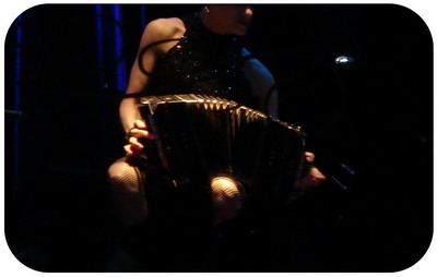 Tickets for Tango show in Buenos Aires El Querandi sensual lady musician with her instrument 